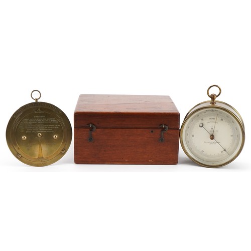 46 - Negretti & Zambra of London, brass cased wall hanging compensated barometer housed in an oak case wi... 