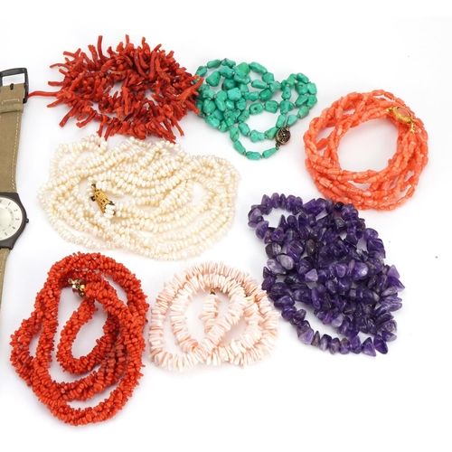 2626 - Antique and later jewellery and wristwatches including coral necklaces, amber necklace, Camy, Swatch... 