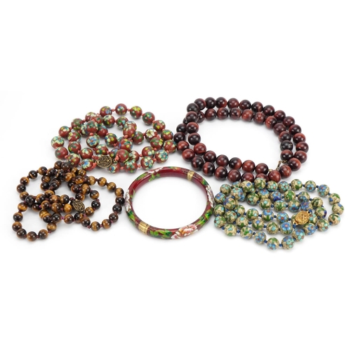 2625 - Two Chinese cloisonne bead necklaces, two tiger's eye bead necklaces and a cloisonne bangle