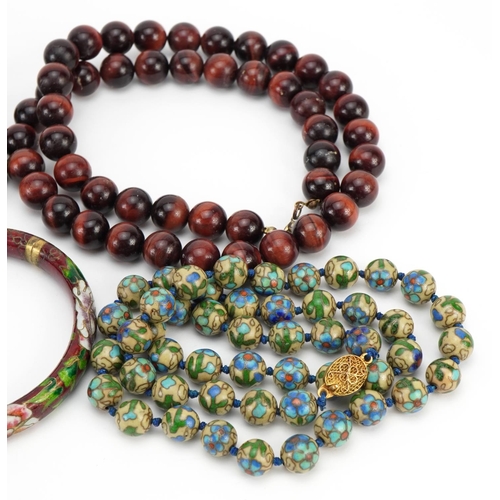 2625 - Two Chinese cloisonne bead necklaces, two tiger's eye bead necklaces and a cloisonne bangle