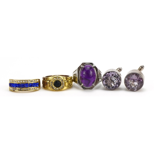 2589 - Pair of silver purple stone cufflinks and three dress rings