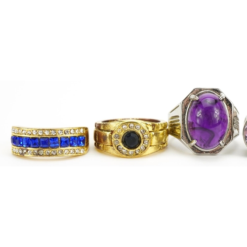 2589 - Pair of silver purple stone cufflinks and three dress rings