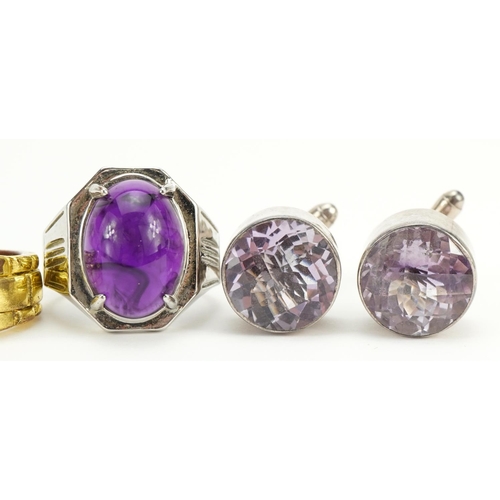 2589 - Pair of silver purple stone cufflinks and three dress rings