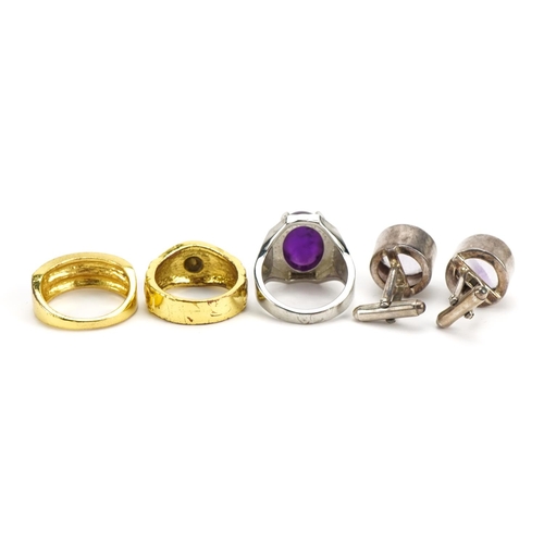 2589 - Pair of silver purple stone cufflinks and three dress rings