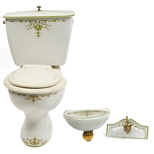 1679 - Victorian style bathroom set comprising toilet, cistern and wash basin with tap, the toilet and cist... 