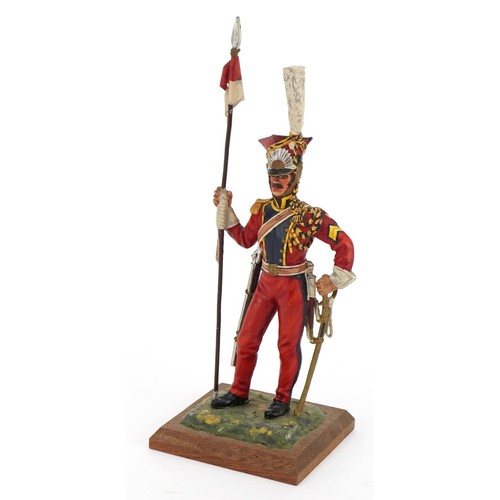 1785 - Hand painted cast metal figure of a soldier in uniform, 21cm high