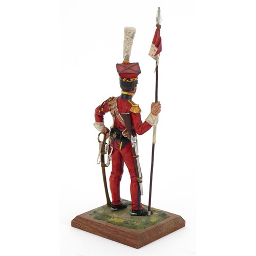 1785 - Hand painted cast metal figure of a soldier in uniform, 21cm high