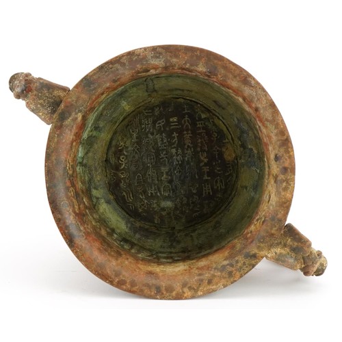 63 - Chinese patinated bronze archaic style censer with twin handles, character marks to the interior, 29... 