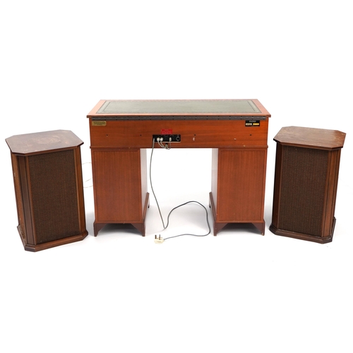 855 - Yew twin pedestal desk gramophone cabinet housing a Garrard SP25MKV turntable, Dynatron tuner amplif... 