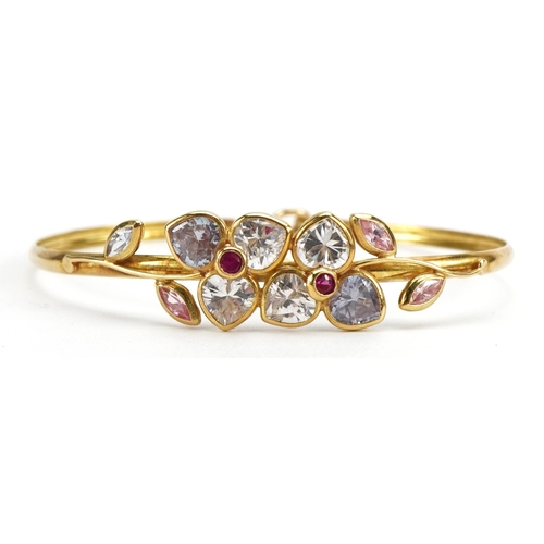 2102 - 18ct gold clear, pink stone and ruby double flower head bracelet, 6cm wide, 6.2g