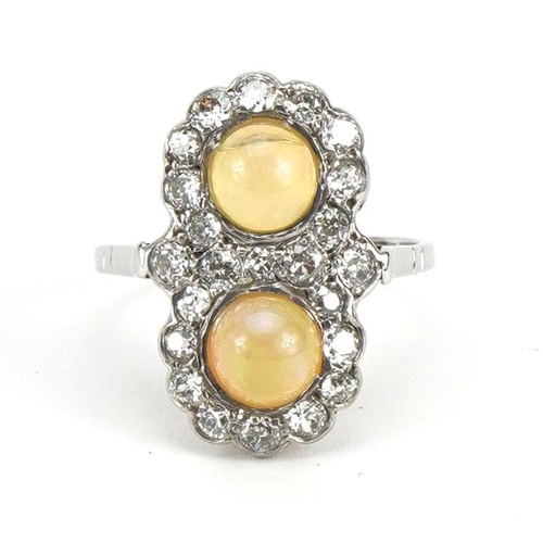 2105 - Victorian style 18ct white gold diamond cluster ring set with two cabochon opals, total opal weight ... 