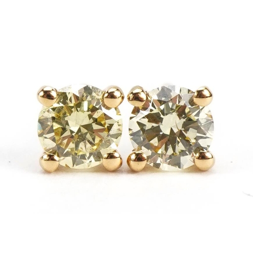 2071 - Pair of 18ct gold diamond solitaire stud earrings, total diamond weight approximately 0.61 carat, 5m... 