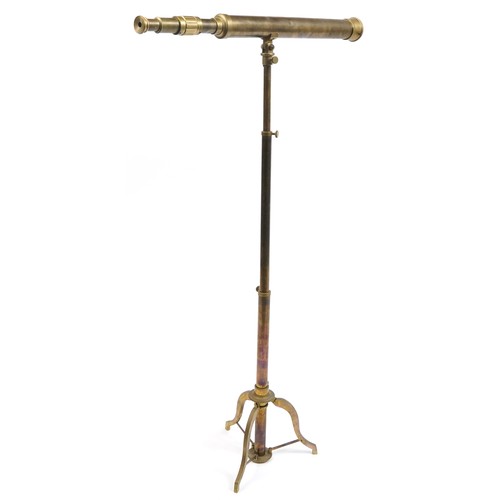 157 - Naval interest brass floor standing telescope with adjustable tripod base on stand