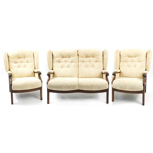 840 - Wooden framed cream upholstered two seater settee and two matching armchairs, the settee 97cm high x... 