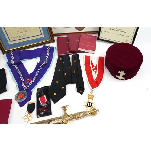 1949 - Masonic regalia including a robe, Knights Templar cross and sword with fitted case