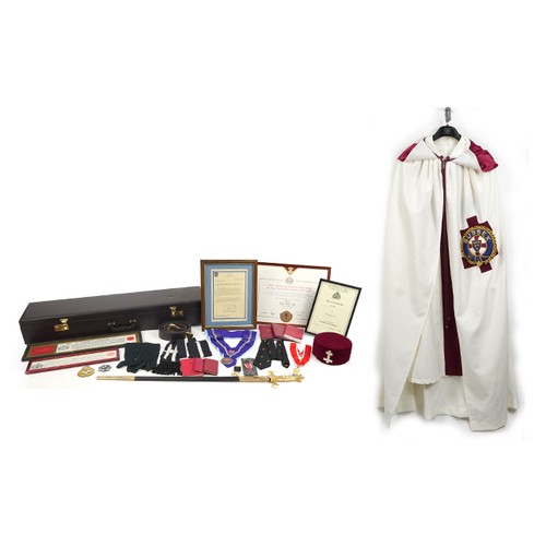 1949 - Masonic regalia including a robe, Knights Templar cross and sword with fitted case