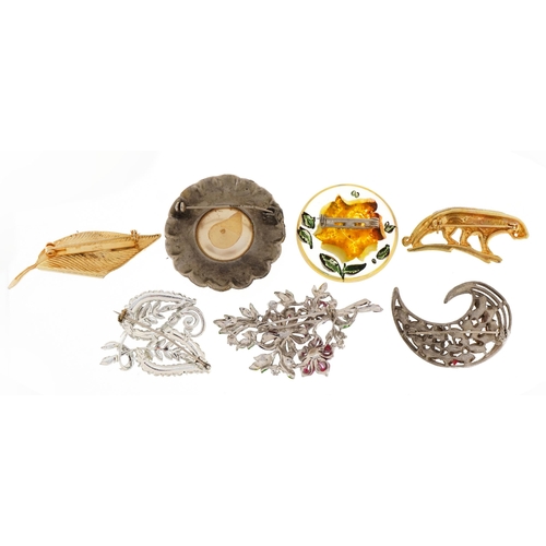 2596 - Seven vintage costume jewellery brooches including plastic rose and a leopard, the largest 7cm wide