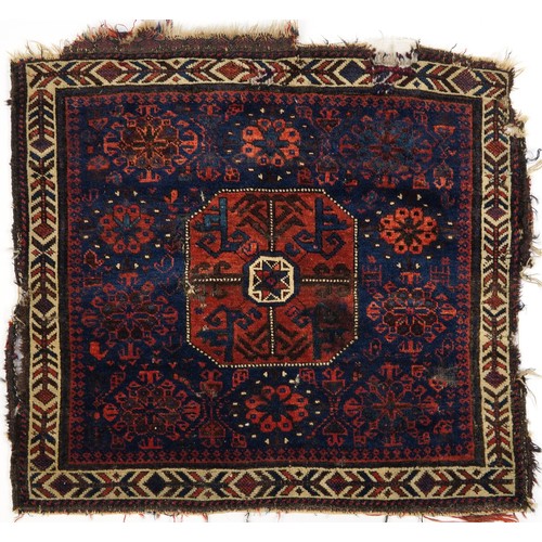 495 - Afghan red and blue ground Belutch rug with all over geometric design, 86cm x 76cm