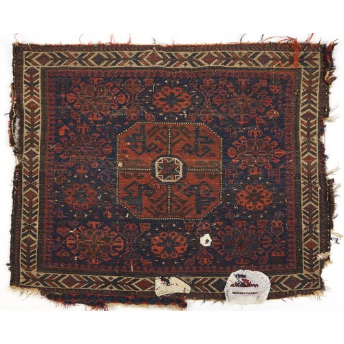 495 - Afghan red and blue ground Belutch rug with all over geometric design, 86cm x 76cm