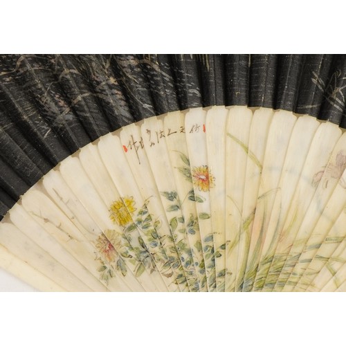 1702 - Two Chinese bone brisee fans comprising a silk example hand painted with birds amongst flowers and o... 