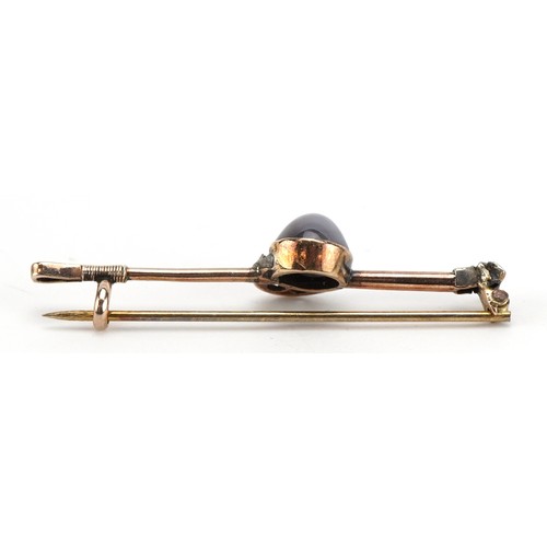 2119 - Equestrian interest unmarked gold cabochon star sapphire and diamond bar brooch in the form of a joc... 