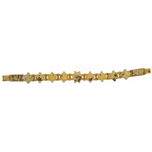 2063 - Continental gilt metal flower head multigem bracelet, set with colouful stones including rubies, eme... 