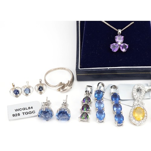 2630 - Silver jewellery set with semi precious stones including amethyst, sapphire and citrine, total weigh... 