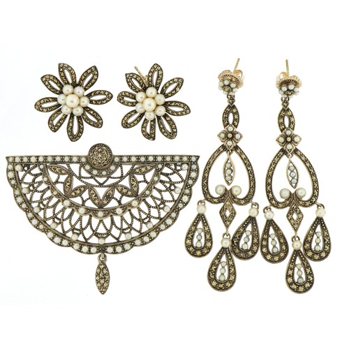 2631 - Silver marcasite and pearl brooch with matching earrings and a pair of similar earrings, the largest... 