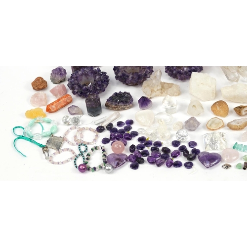 1114 - Collection of rock and mineral specimens including amethyst, rose quartz and rock crystal, the large... 