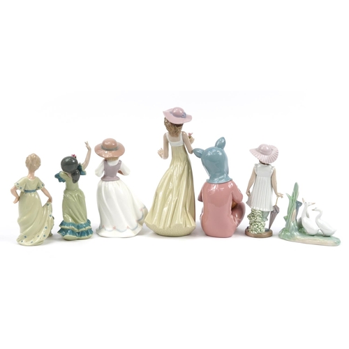 1101 - Seven Nao porcelain and Leonardo Collection figurines and figures, the largest 25.5cm high