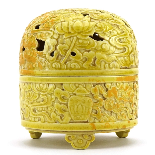 204 - Chinese porcelain yellow glaze tripod incense box and cover pierced and decorated in low relief with... 