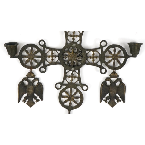 1106 - Russian patinated bronze articulated hanging cross with bells, 70.5cm high