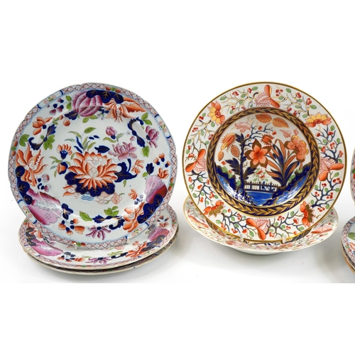 40 - Pair of early 19th century Derby Imari porcelain soup bowls and seven ironstone plates, the largest ... 