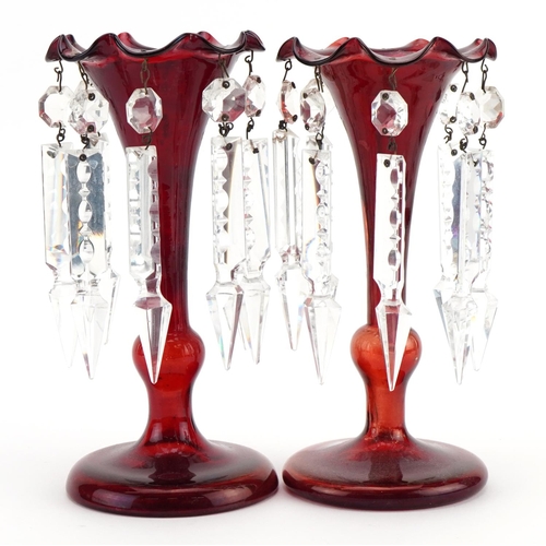 116 - Pair of Bohemian ruby glass lustres with cut glass drops, each 20.5cm high