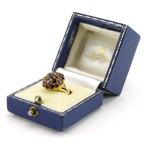 2057 - 9ct gold bohemian garnet cluster ring housed in a Bruford Eastbourne - Exeter tooled leather box, si... 