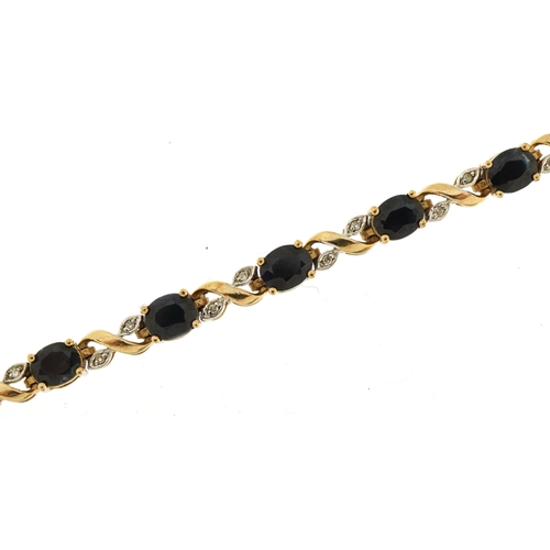 2084 - 9ct gold sapphire and diamond bracelet, 18cm in length, 8.7g