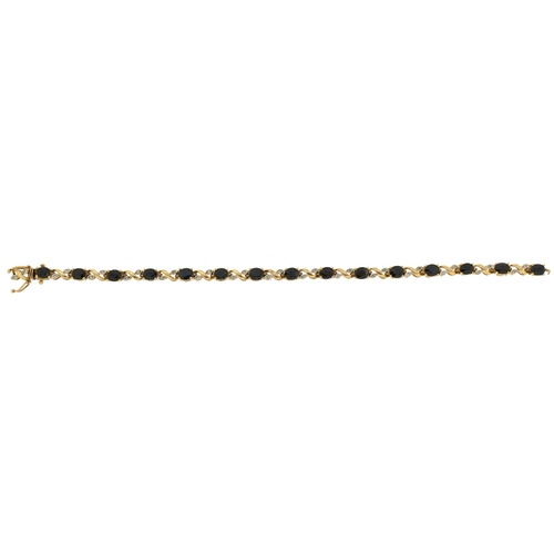 2084 - 9ct gold sapphire and diamond bracelet, 18cm in length, 8.7g