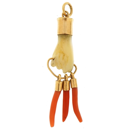 2030 - Antique unmarked gold mother of pearl figa charm with three coral drops, 5.5cm high, 5.1g