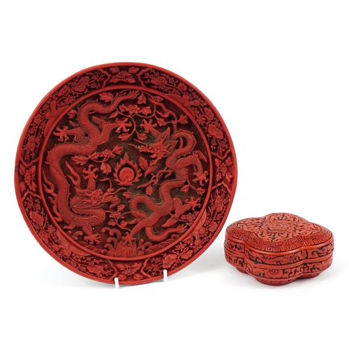 1145 - Chinese cinnabar lacquer plate and box with cover carved with flowers, the largest 30cm in diameter