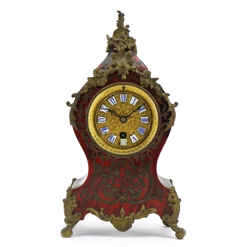 11 - 19th century French ebony and boulle work cartouche shape mantle clock with ornate brass mounts, the... 