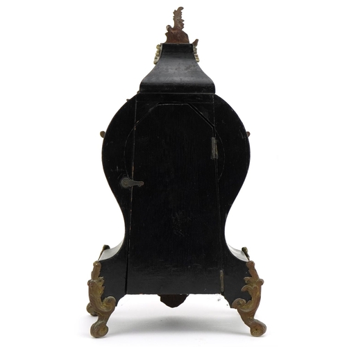 11 - 19th century French ebony and boulle work cartouche shape mantle clock with ornate brass mounts, the... 