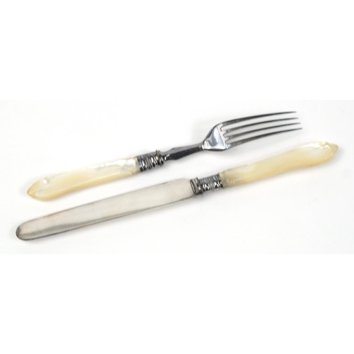 2786 - Set of six silver plated fish knives and forks with mother of pearl handles housed in a fitted mahog... 