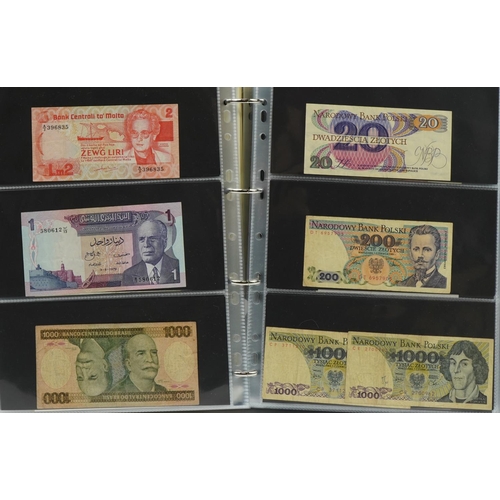 560 - Collection of world bank notes arranged in an album