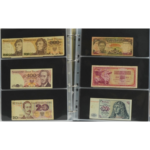 560 - Collection of world bank notes arranged in an album