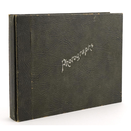 580 - Black and white photographs arranged in an album, some military interest including 1937 Coronation P... 