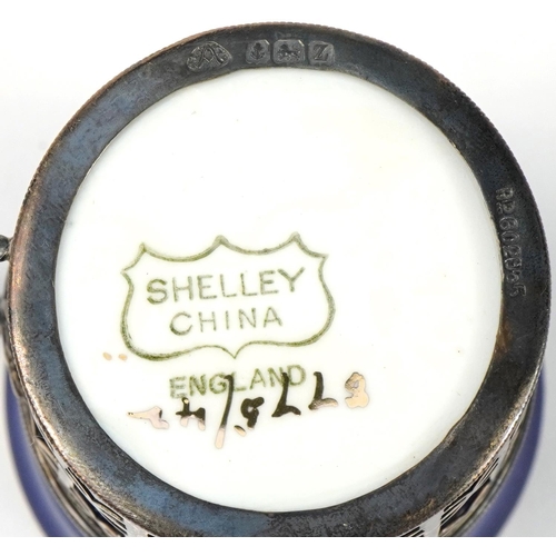 47 - Set of six Shelley blue ground coffee cans and saucers with silver cup holders housed in a fitted si... 