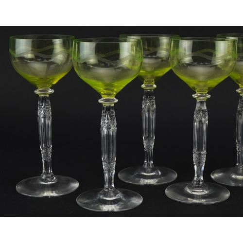 404 - Set of eight cut glass wine glasses with uranium coloured glass bowls, each 18.5cm high