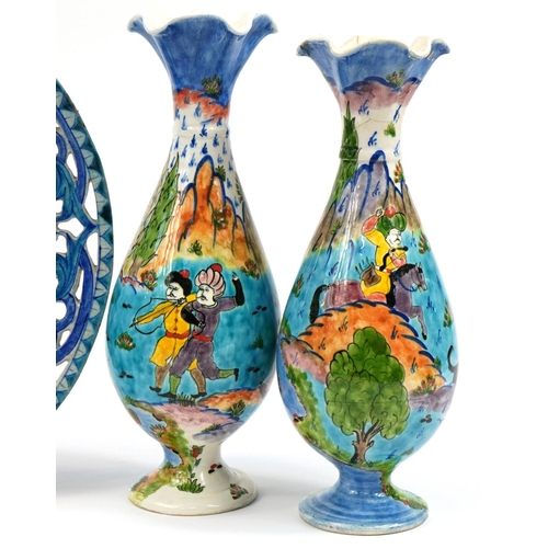 1204 - Turkish pottery including a pair of vases hand painted with huntsmen on horseback, pierced plate and... 