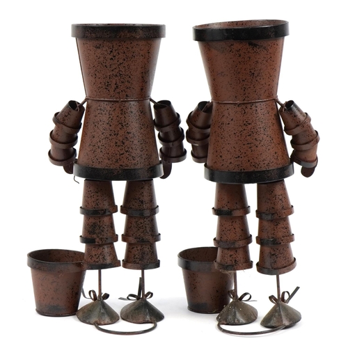 1177 - Pair of bronzed tin flower pot men planters, each 49cm high