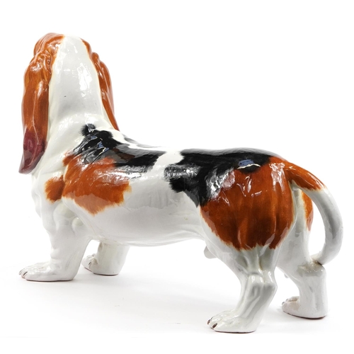 1091 - Life sized pottery model of a Bassett Hound, 78cm in length